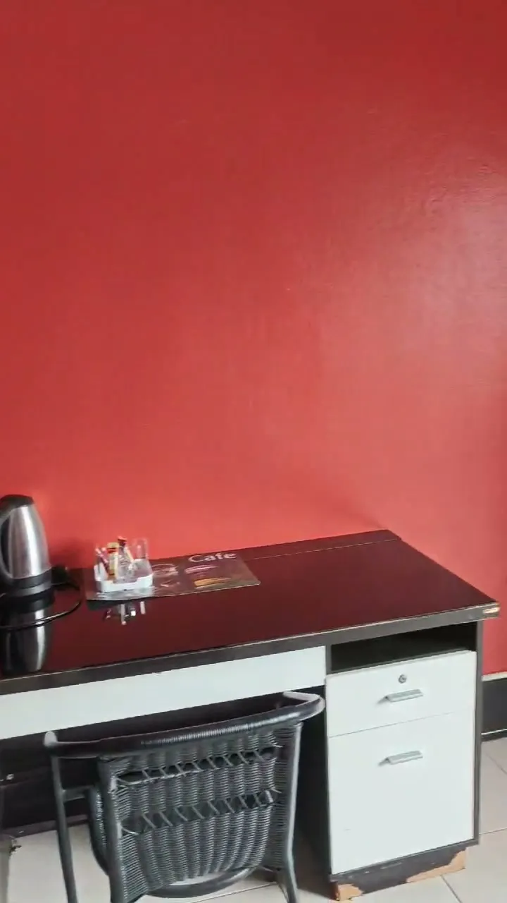 Desk in the suite with a kettle and tea-making tray